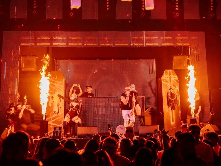 Flame jets on both sides of the cross-lined stage during EPICO's Halloween show
