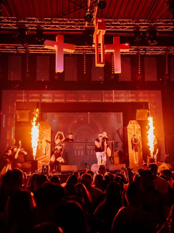 Flame jets on both sides of the cross-lined stage during EPICO's Halloween show